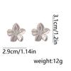 The silver alloy floral stud earrings with a cold and elegant style are versatile for daily, casual and commuting women