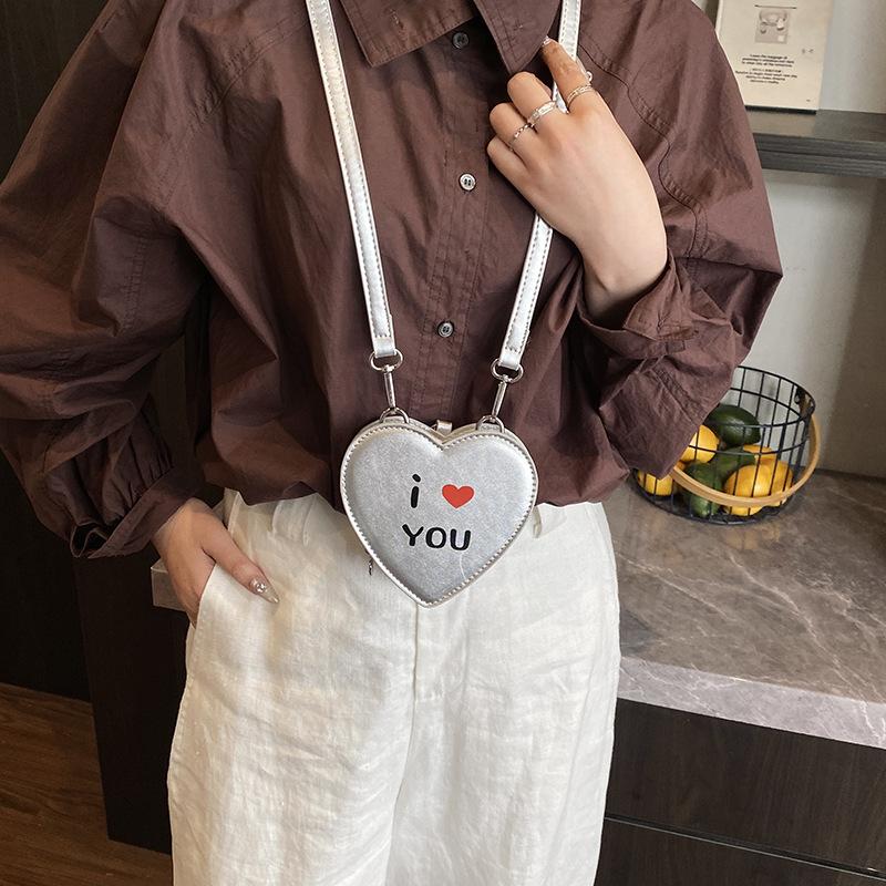 2025 summer new cute casual style small bag women's niche design sense messenger bag printed heart-shaped mouth red envelope