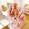 Super Cute 3-Year-Old Cartoon Doll Keychain with Flowing Sand Pendant