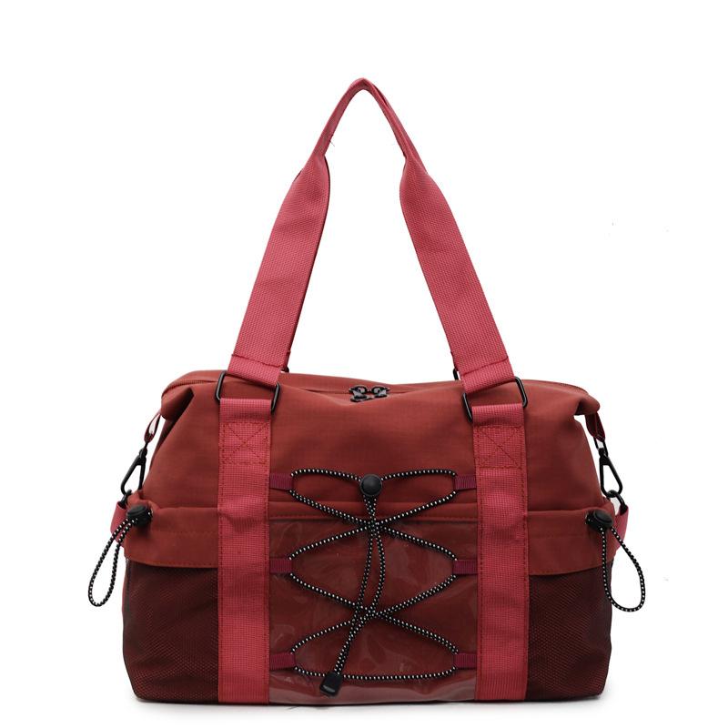 Large capacity, lightweight and versatile travel tote bag women s early autumn outdoor leisure drawstring travel commuter messenger bag tide