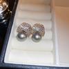Grey pearl C-shaped earrings, fashionable temperament, high-end stud earrings, niche French elegant light luxury earrings, women