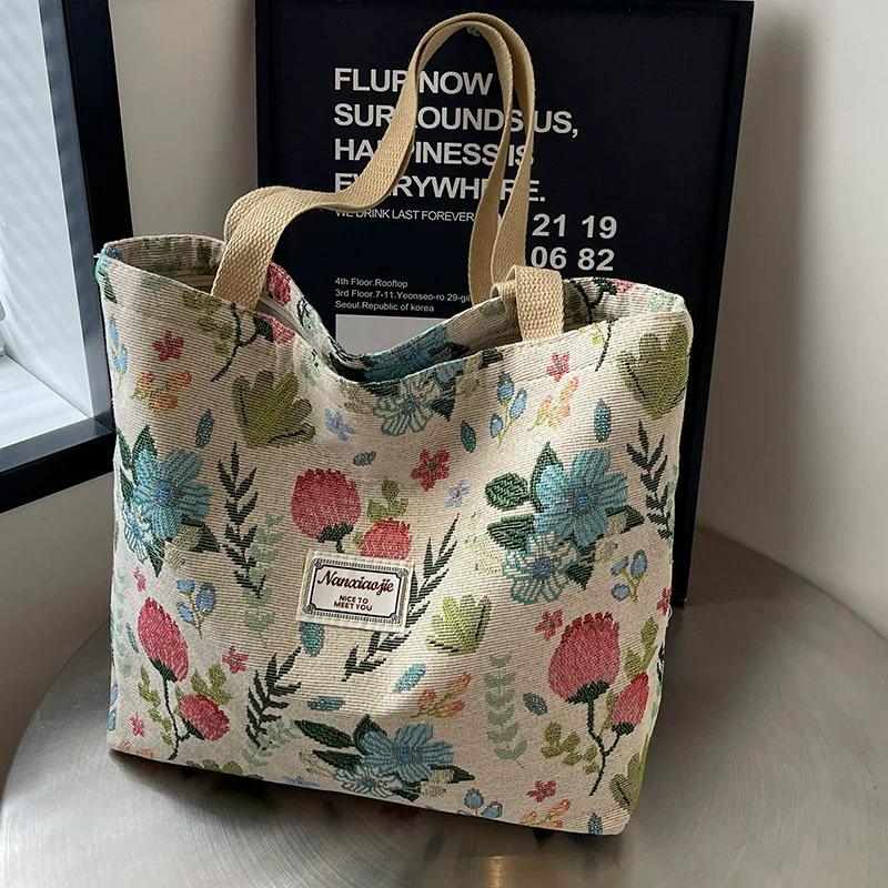 Canvas bag women's large-capacity portable shoulder handbag niche design work commuting tote bag