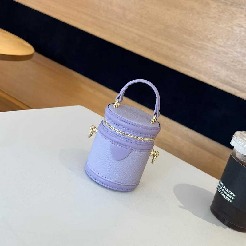 2026 new leather women's bag cylindrical vertical mini lunch box bucket bag chain earphone bag cosmetic bag cross-border batch