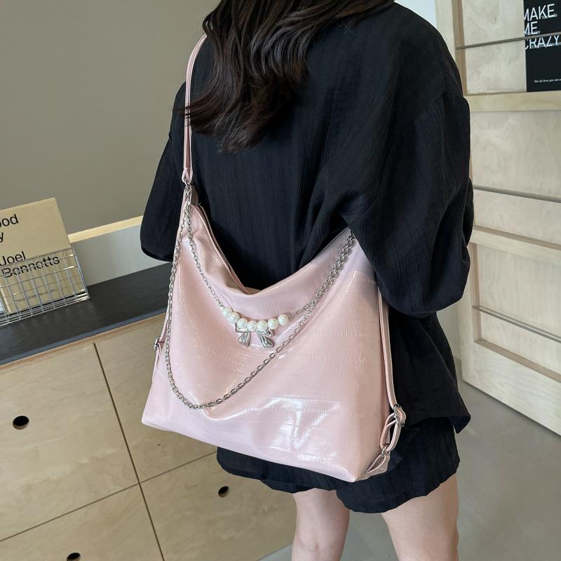 

2025 summer new large-capacity bag women s shoulder bag student class travel commuting texture backpack розовый