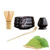 This 4-piece tea ceremony set includes a tea whisk, a 100-piece tea whisk holder, a straightening tool, a tea scoop, and a matcha bowl. It's compact a