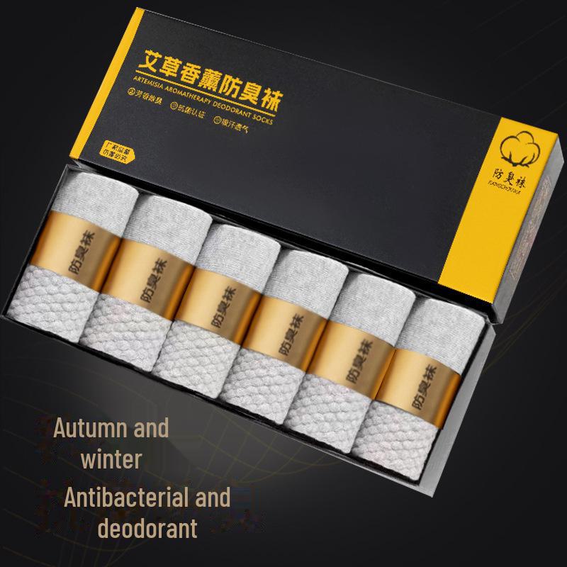 Men's Mid-Tube Socks with Wormwood Aromatherapy, Antibacterial, Breathable, Sweat-Absorbent, and Massaging Bottom for Autumn/Winter.