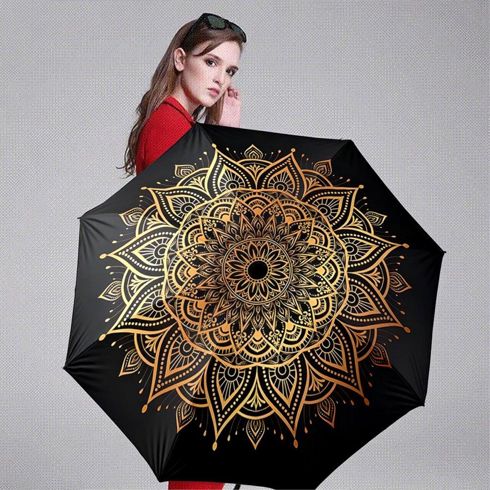A Collapsible Automatic Umbrella Featuring a Golden Mandala Pattern Against a Black Backdrop. It S a Convenient Outdoor Access