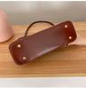 Women's Fashion Versatile French Underarm Bag - High-End, Simple, Niche Design, Hand-Held, Single Shoulder Handbag.
