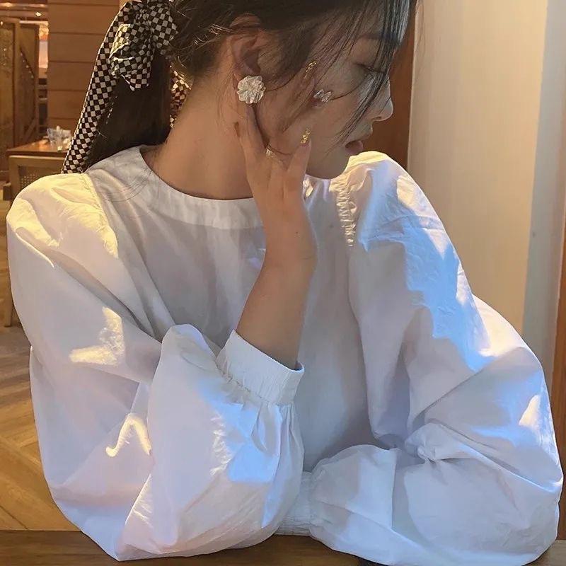 French loose white puff sleeve round-neck shirt, women's early autumn new design shirt, unique niche top