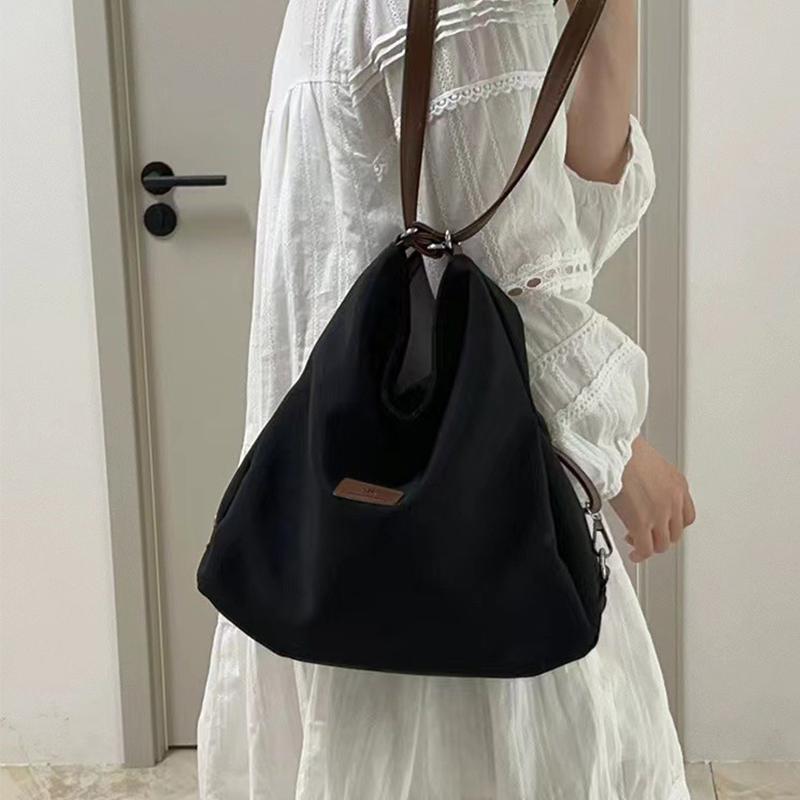 Große Kapazität Modische Canvas-Umhängetasche Damen Freizeit Literatur und Kunst Einfacher einfarbiger Umhängerucksack