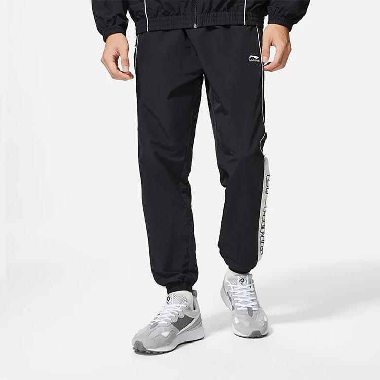 Li-Ning Trendy Colorblock Loose Tapered Knit Sweatpants Men Bottoms Black AYKS837-3