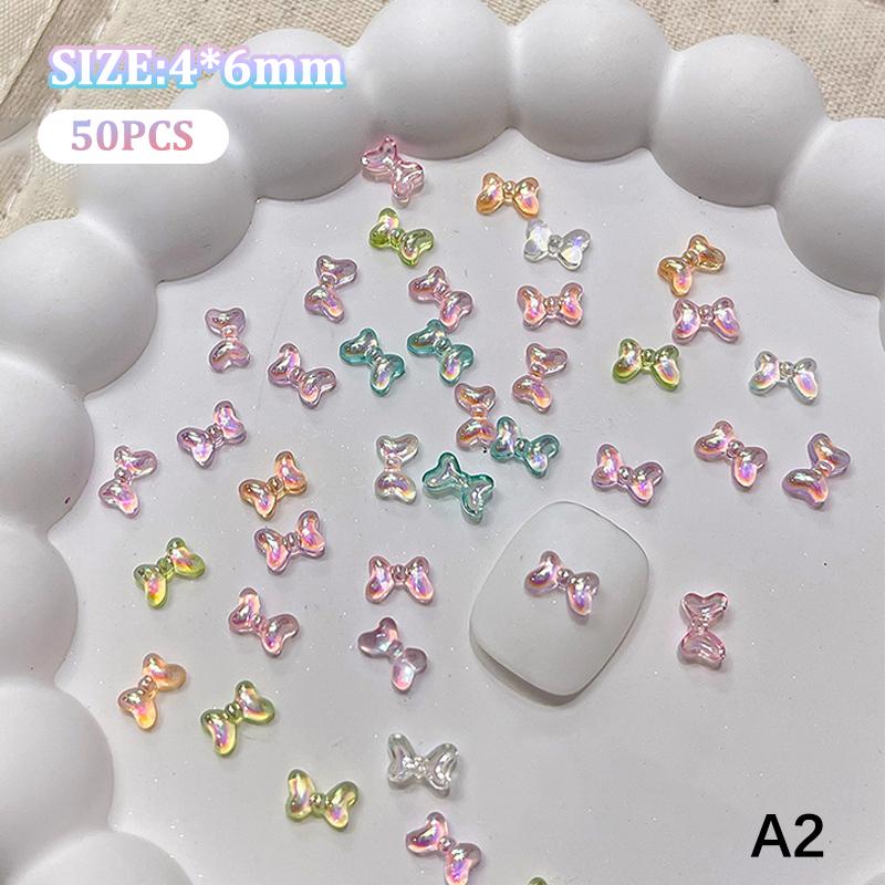 50Pcs Manicures Decoration Charm Colorful Bow Nail Art Accessory Illusionary AB Color Resin Ribbon Bows