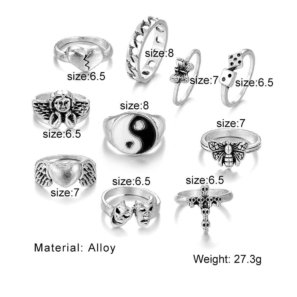 Set di anelli di gioielli intagliati con croce di scheletro di Tai Chi con farfalla di angelo dell'amore da 10 pezzi