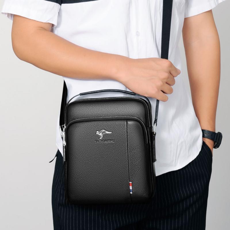 Die erste Schicht aus wasserdichtem und verschleißfestem Rindsleder mit großem Fassungsvermögen, koreanische Version der trendigen vertikalen Handtasche für Kunden
