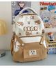 Schoolbag cute cartoon bear milk whirring primary school backpack first and second grade cartoon children's fun contrasting color splicing backpack