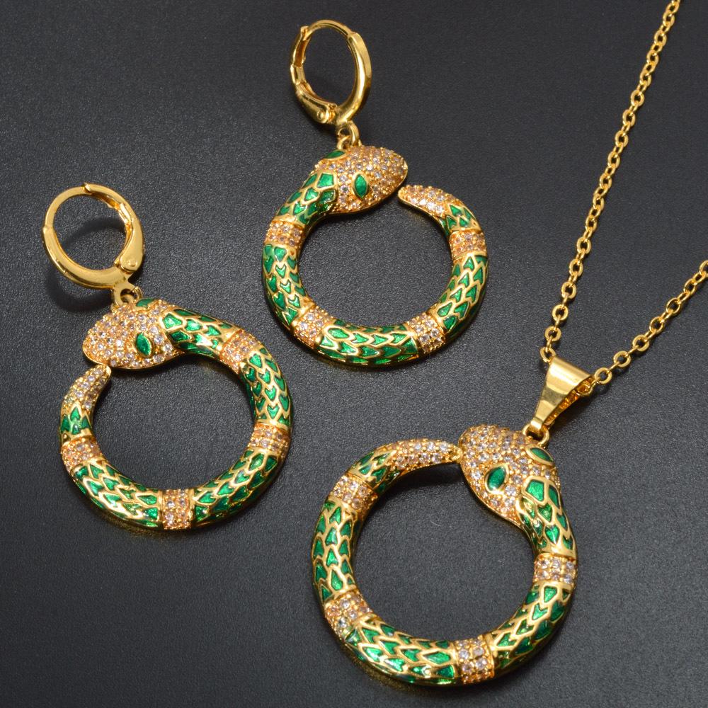 

Elegant European & American Zircon Gold-Plated Jewelry Set: Fashionable, Versatile Earrings & Pendant