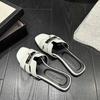 Korean high-end feeling~ slippers women's outer wear 2025 summer seaside beach shoes one-word flat-bottom lock cool slippers