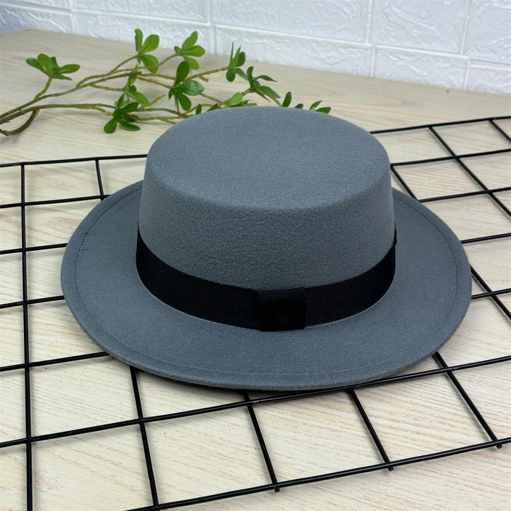 Simple black strap flat top woolen top hat autumn and winter woolen hat men's and women's hats flat edge retro British gentleman's hat