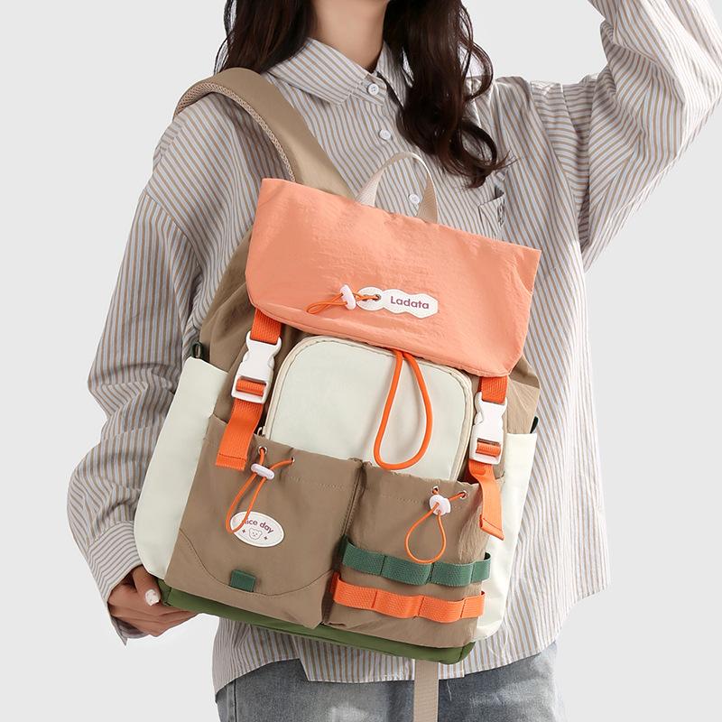 Schoolbag Korean version fashionable large-capacity bag women's 1011 spring new high-value casual commuting simple student backpack