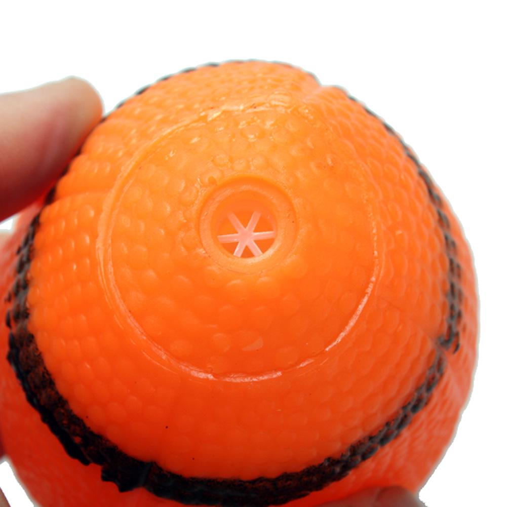 orange squeaky dog ball