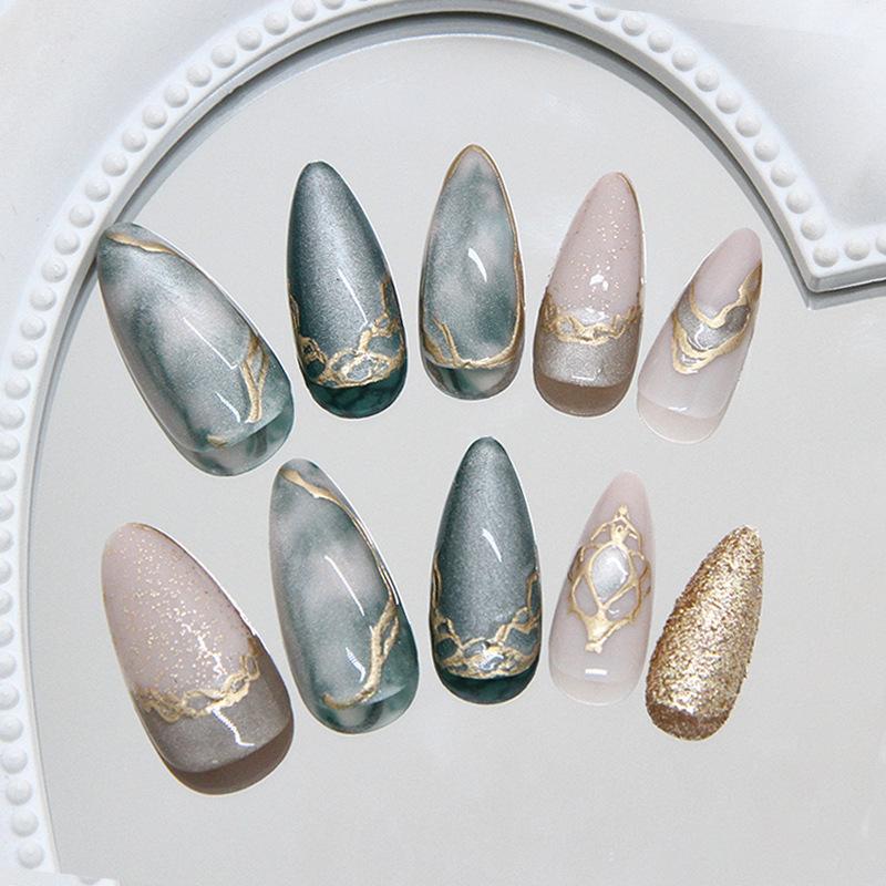 Kocie oko nieregularne złote rozmazane odpinana zbroja do noszenia 24 sztuki paznokci do wciskania