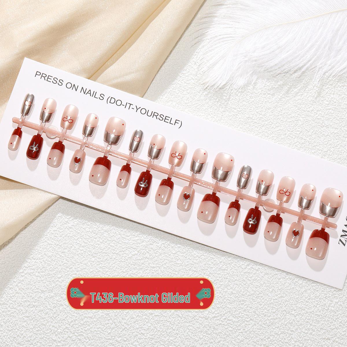 

Двухцветные накладные ногти «кошачий глаз» с золотым бантиком XS/S/M Set