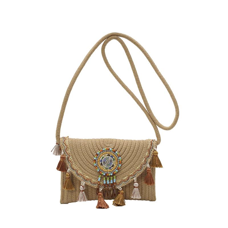 

2025 popular straw bag new seaside literary women s woven bag ethnic style niche versatile fringed messenger bag хакі