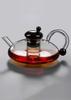 Heat-Resistant Glass Teapot with Black Teacup Transparent Kettle Tea Set with Tea Infusion Filter For Home Boiling Tea