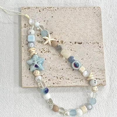 Telefon aksesuarları – Telefonlar için Askılar ve Anahtarlıklar