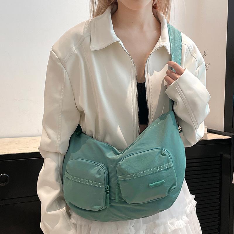 Premium new trend niche design women's bag solid color casual creative shoulder bag