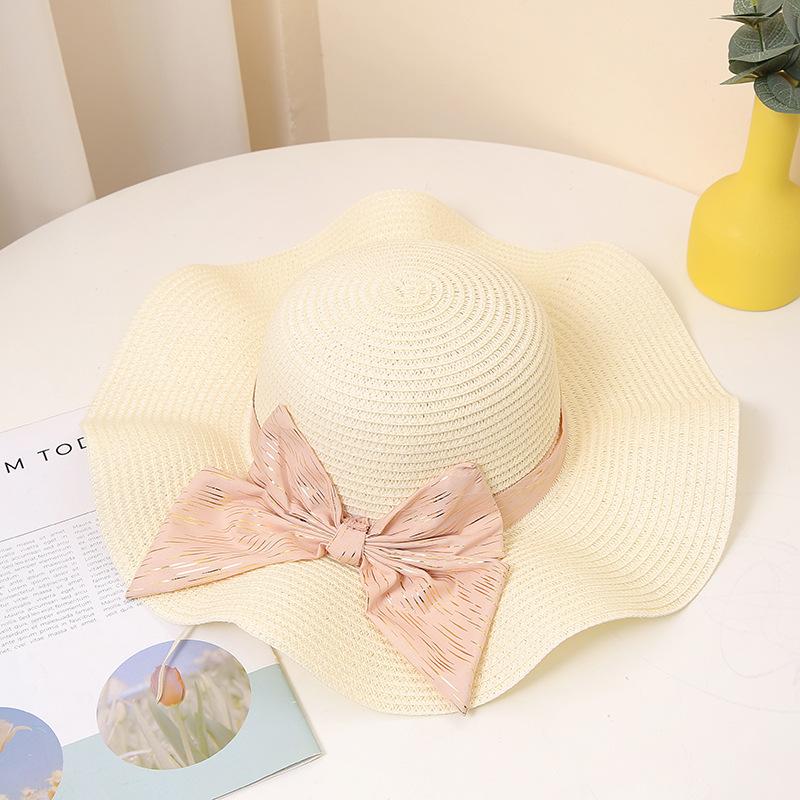 Summer Sun Hat for Women - Wide Brim with Bowknot, Breathable Straw Beach Cap, UV Protection, Fashionable Travel Accessory