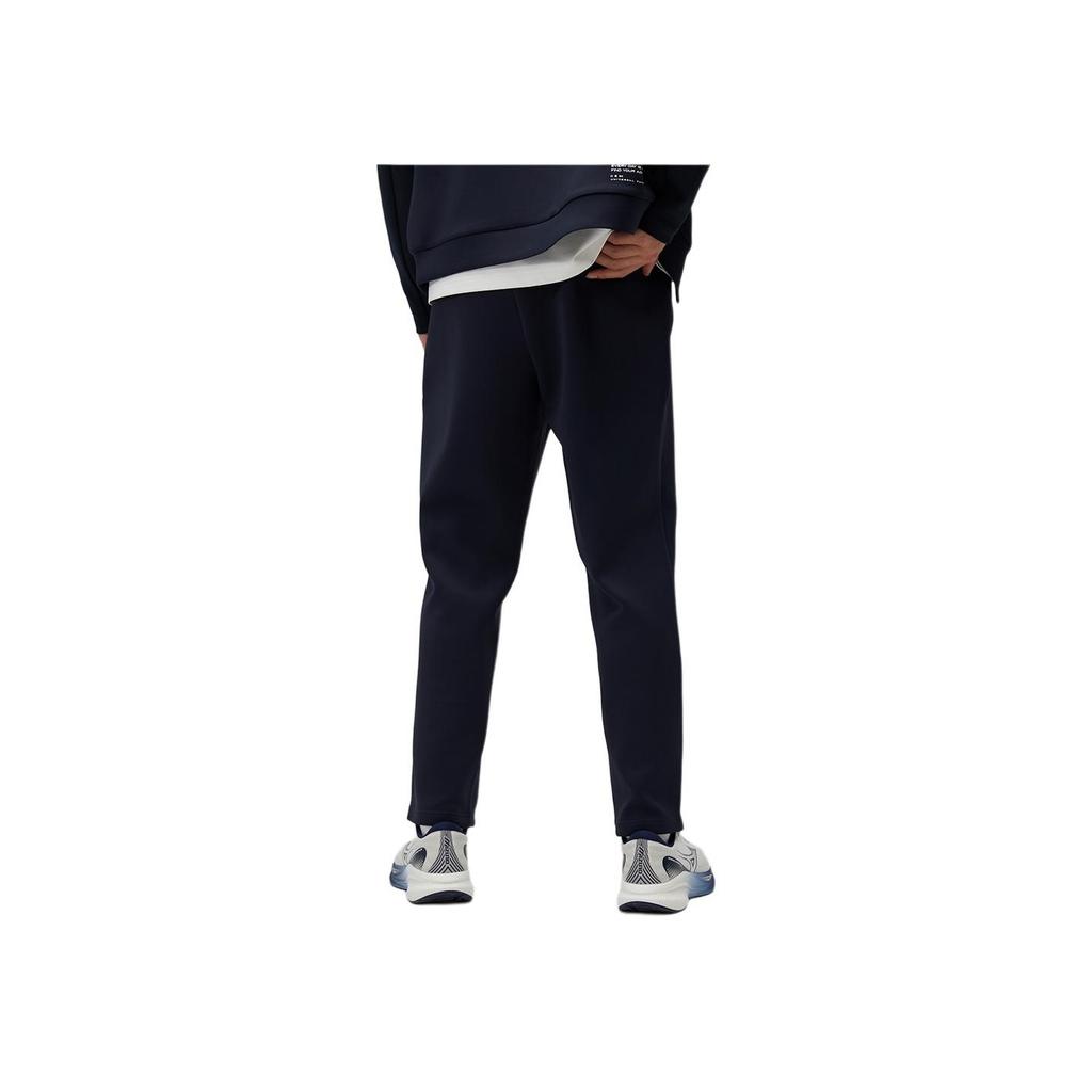 Mizuno Strečové sportovní kalhoty Slim Fit s vysokým pasem Pánské kalhoty Půlnoční modrá K2CD41A1-14