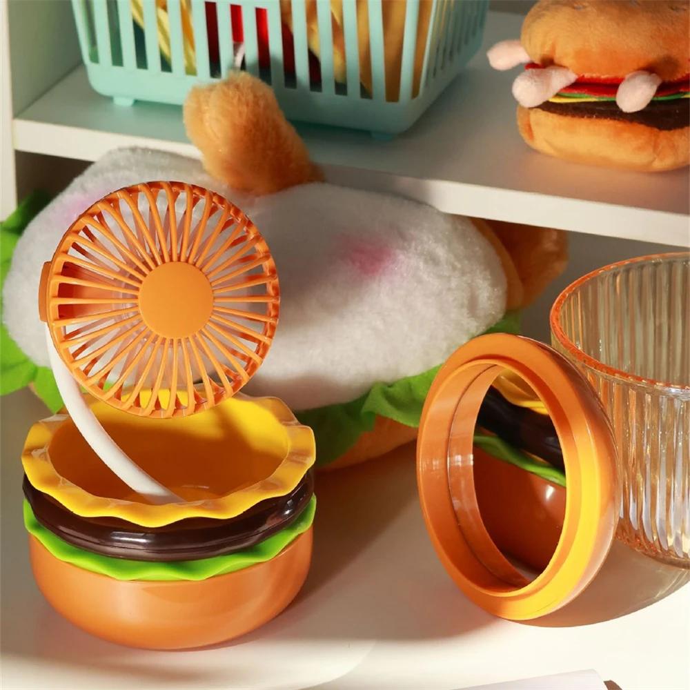 

Portable Mini Handheld Style Small Fan Low Noise Type-C Wireless Charging Cartoon Hamburger Desktop Fan With Hand Mirror!