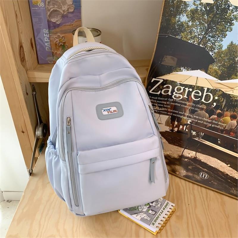 Schoolbag large-capacity schoolbag female junior high school students high school students 1011 new Korean version campus water-proof backpack