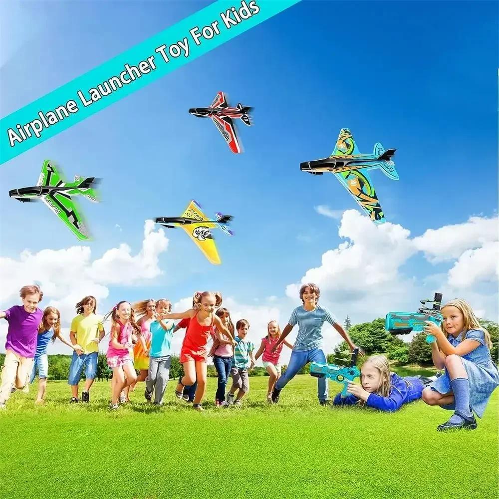 Beliebte Schaumstoff-Ausstoß-Flugzeugspielzeugpistole, Kinder-Flugspielzeug für draußen, Pistole, rollendes Flugzeugmodell, Outdoor-Spielzeug