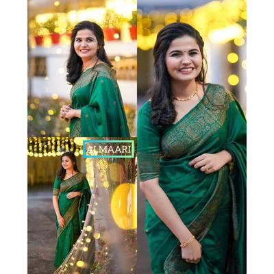 Silk Saree da loja ALMAARI é adornado com lindos trabalhos Zari em forma de motivos tradicionais.