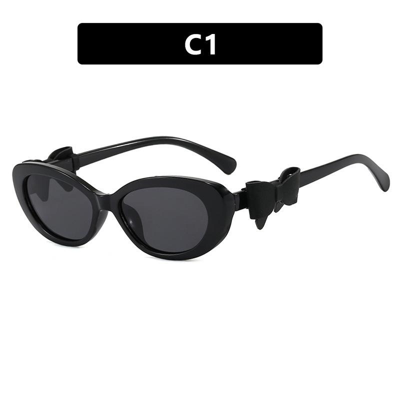 Fashion cat eye sunglasses bow decorative sunglasses women's high-end street photo UV-proof sunglasses