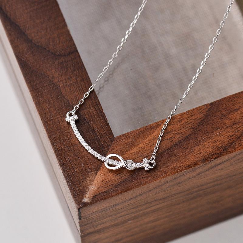 

Улыбающееся ожерелье M ö Bius Обернутое ожерелье с легкой роскошью и нишевым ощущением