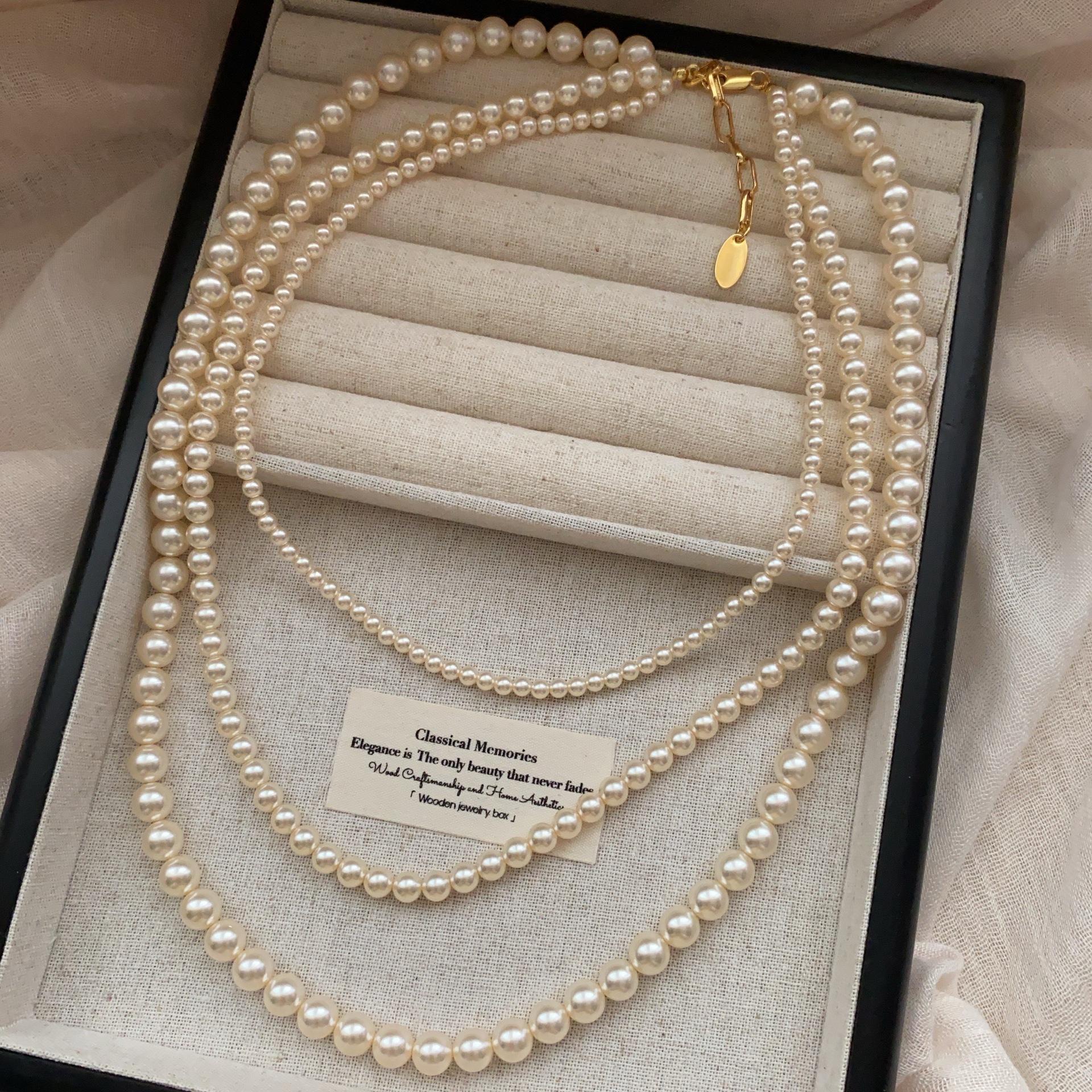 

A stacked pearl necklace light luxury niche decorative long chain neck chain collarbone chain high-end neck accessories pendant