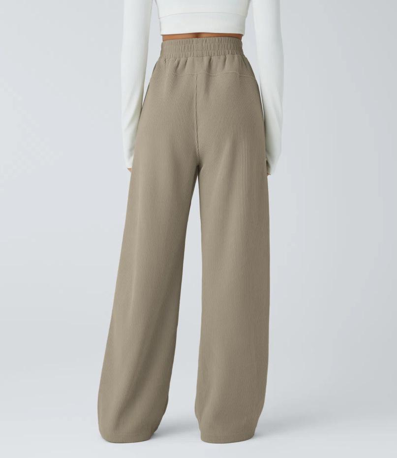 Dampantal med hög midja, raka ben och fickor i manchester