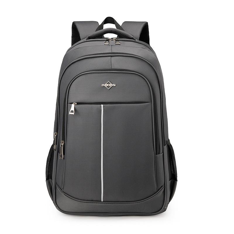 

Men s Student Backpack - Large Capacity Schoolbag for High School & Junior High, Simple Solid Color for Business & Travel сірий колір