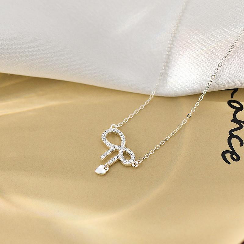 Collier nœud papillon avec incrustation de diamants, tempérament exquis, doux et polyvalent, luxe léger et chaîne de clavicule haut de gamme pour femme