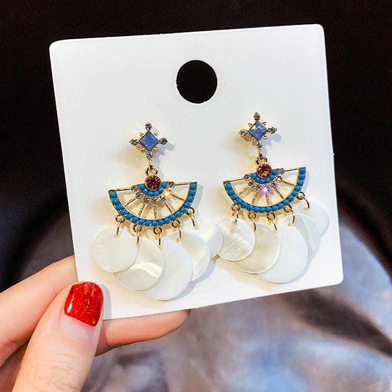 

Белые серьги-ракушки женские богемные геометрические серьги преувеличенные серьги с темпераментом и индивидуальностью