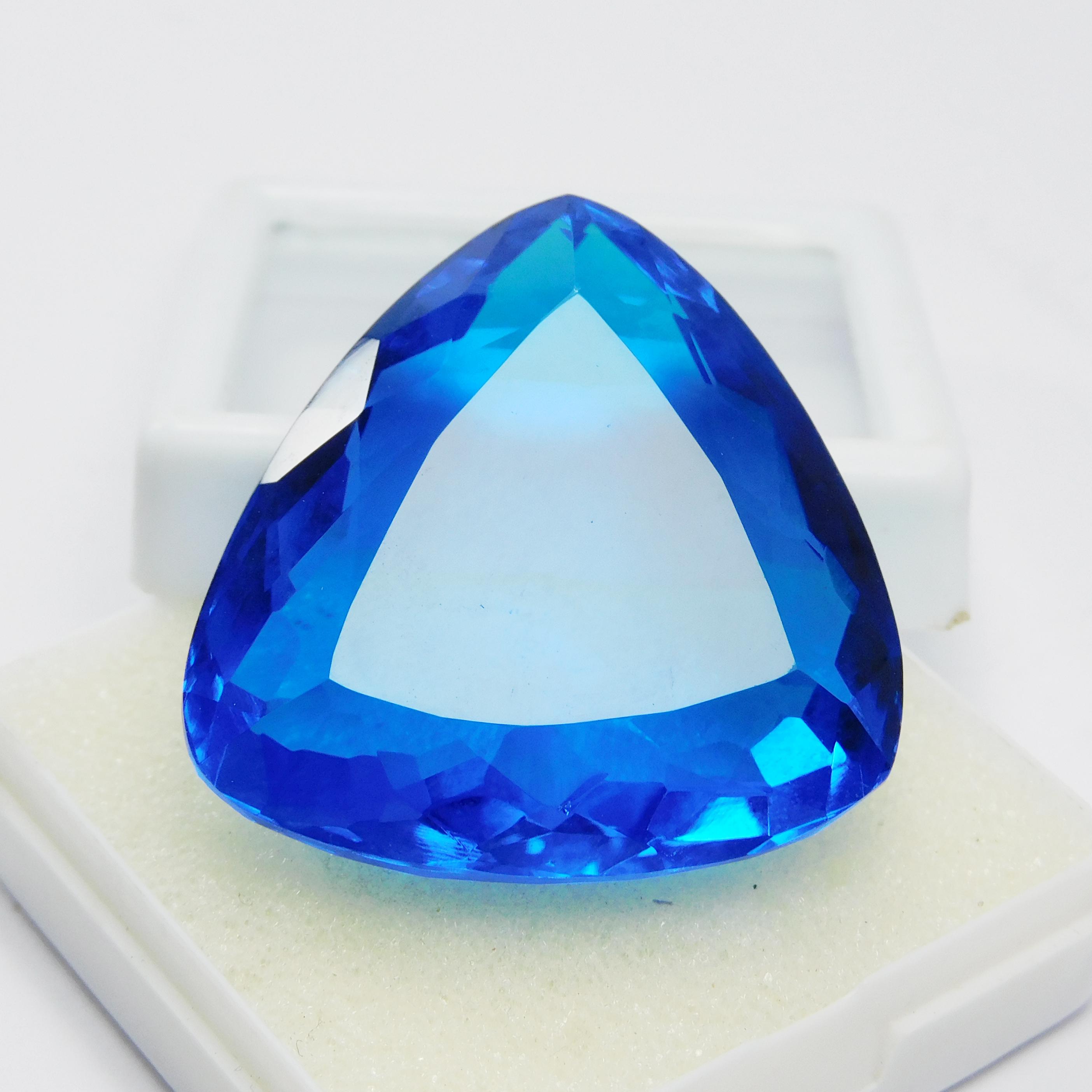 

CERTIFIED 98.35 Ct Loose Gemstone Lab-Created Blue Sapphire Trillion Cut M-1043-Ra 32.7 mm approx синій