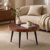 Round Coffee Table Made of Dark Wood with 5 Cm Thick Top Featuring Annual Rings, and Black Metal Legs; Ideal for Small Living Rooms
