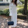Vit stickad klänning med hög midja Mode kvinnor Ribbslagsslag Höst 2023 Smal Elegant Lång Klänning Casual Stickad Solid Festklänning