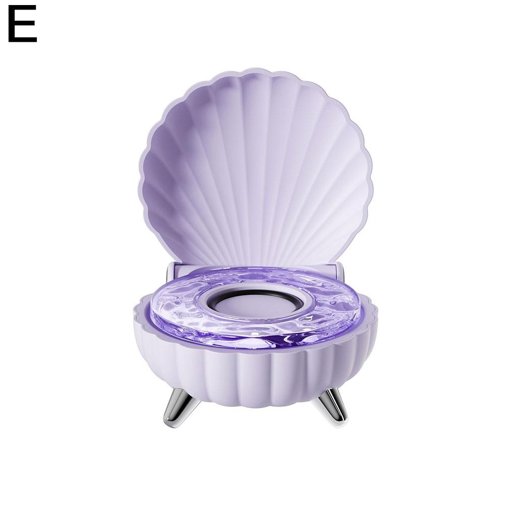 

Colorful Seashell Speaker Portable Bluetooth Speaker Night Light Light and Shadow Shell Projector Premium Gift for Girls фіолетовий