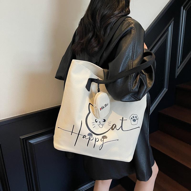 Large Capacity Tote Bag 2025 Autumn New Korean Version of Fashion Niche Cartoon Canvas Bag Casual Commuter Shoulder Bag