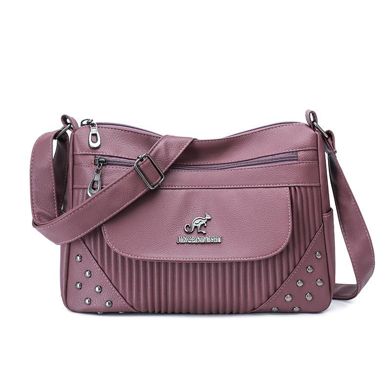 Einfarbige Damen Crossbody-Tasche mit geripptem Panel und Nieten-Details Elegante Kunstleder-Umhängetasche für den täglichen Gebrauch