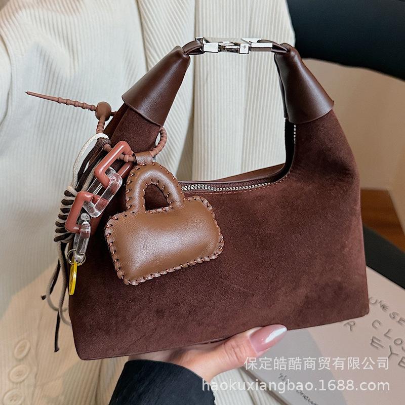 Hand Carry Fashion Dumpling Bag Women 2025 Autumn and Winter Korean Ins Simple Versatile Shoulder Bag Niche Trend Messenger Bag